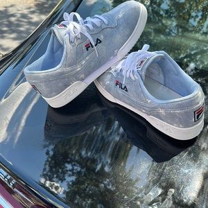 Baby blue and white denim fila size 11 for $60